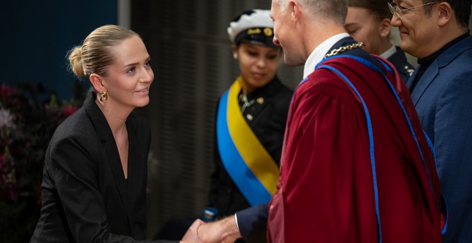 student receiving diploma