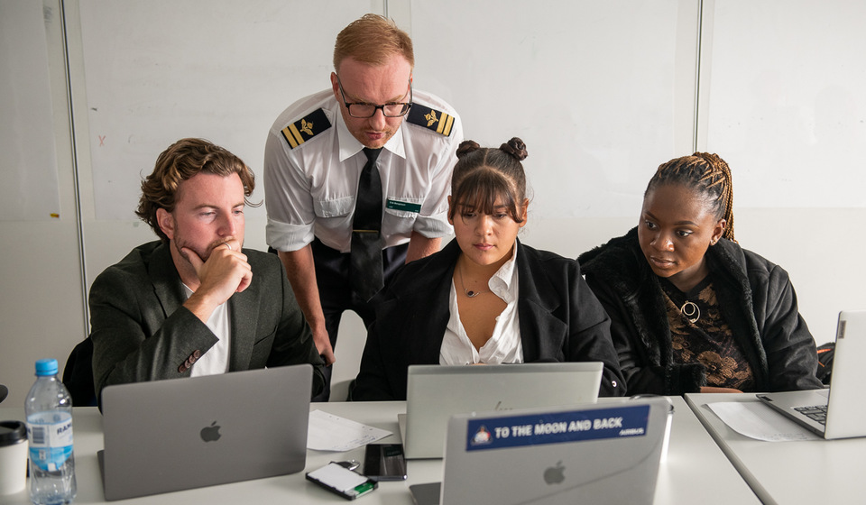 Students and Officers together in a war game.