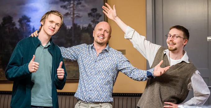 The winners of the wargame tournament celebrate their victory.